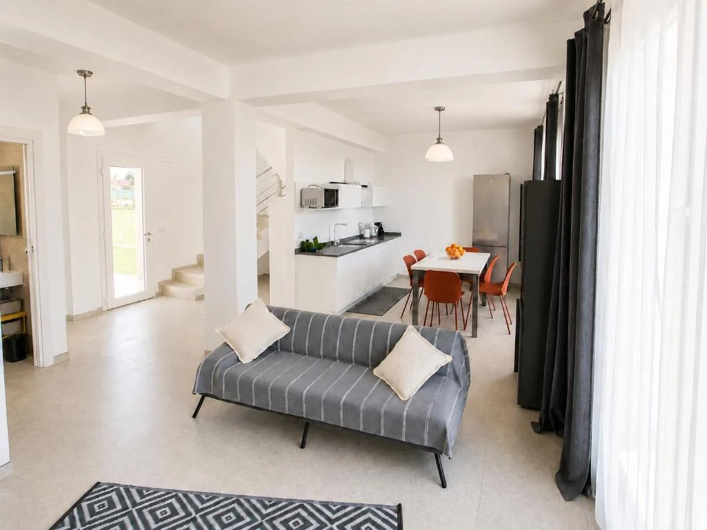 Sala de estar e cozinha de Zaffiri House